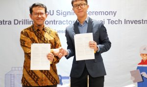 Direktur Utama PDC Faried Iskandar Dozyn dan Head of Digital Power Business Unit Huawei, Mr. Jin Song berfoto usai menandatangani MOU terkait teknologi PV Microgrid. | ist